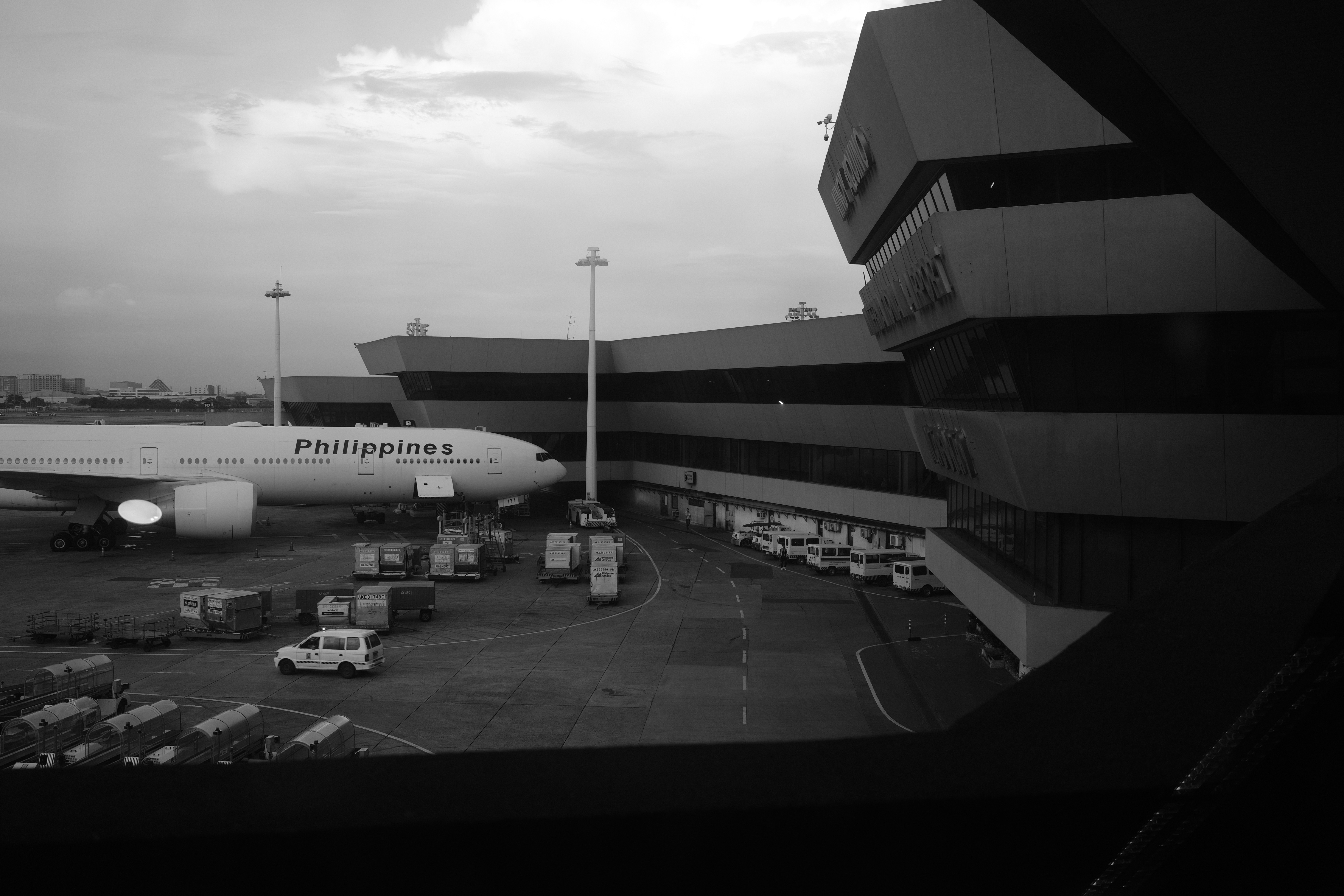 A black and white photo of NAIA Terminal 1.